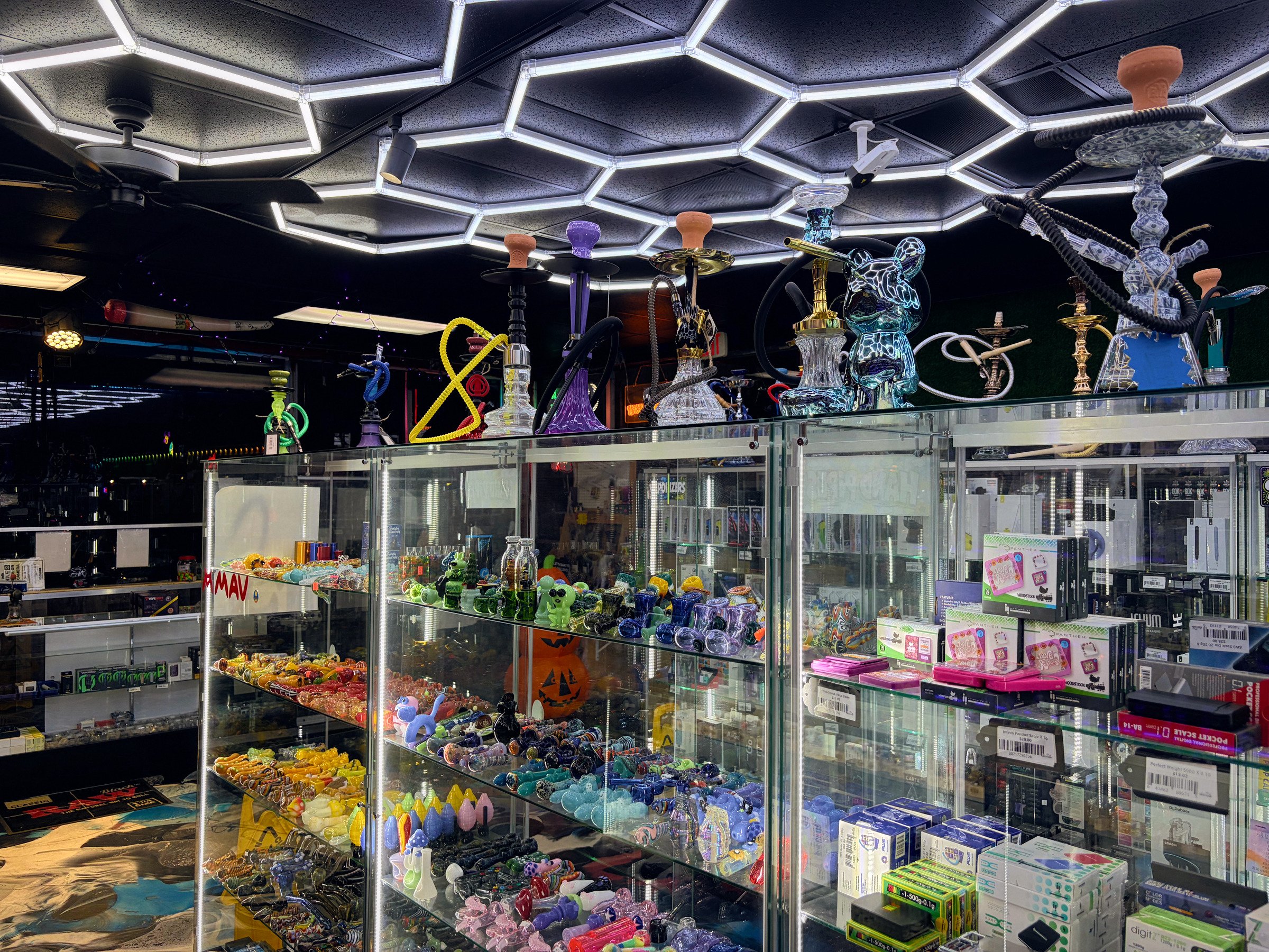 Glass cases under the hex lights at Tennessee Street
