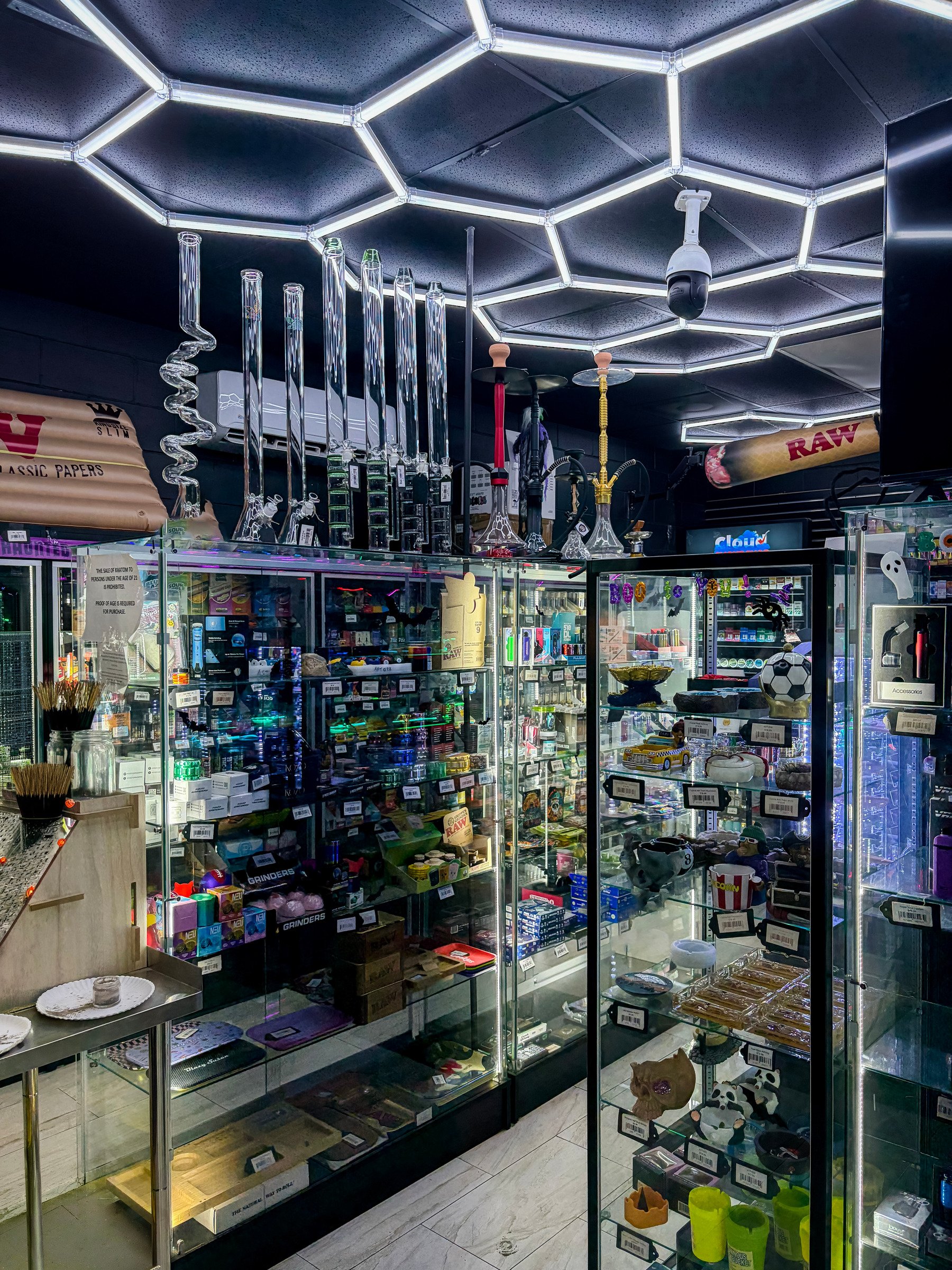 Glass cases under the hex lights at Crawfordville